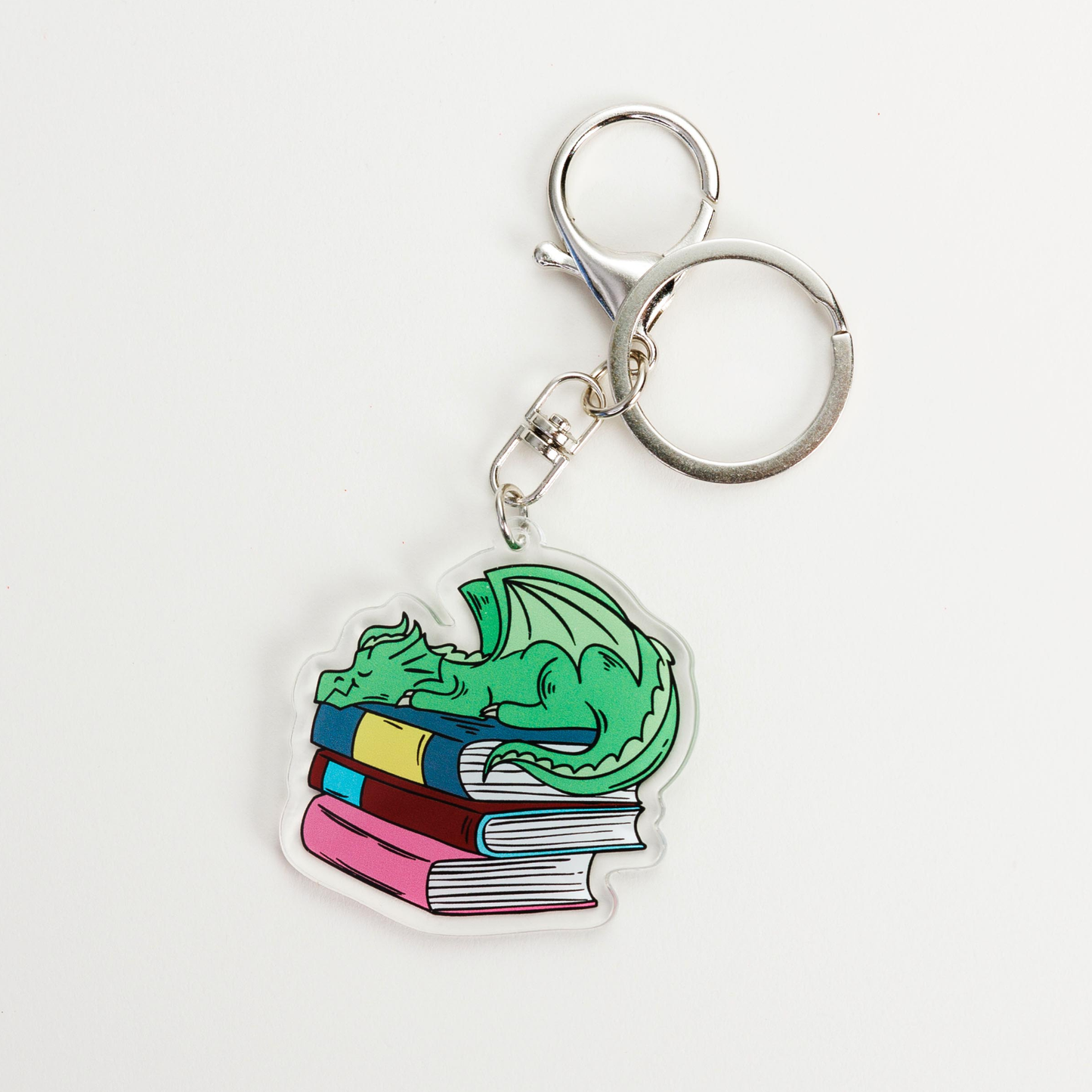 Dragon Sleeping on Book Pile Keychain