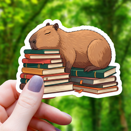 Capybara Sleeping on Books Sticker- 3"