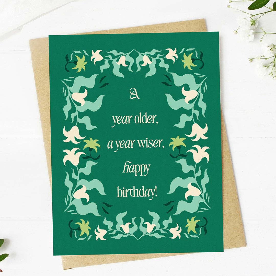 "A year older, a year wiser. Happy birthday!" Greeting Card